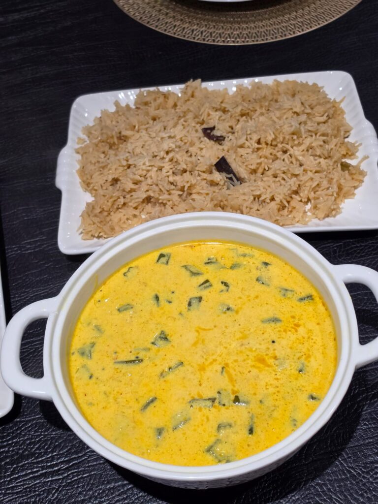 Creamy yoghurt okra curry served with fragrant rice