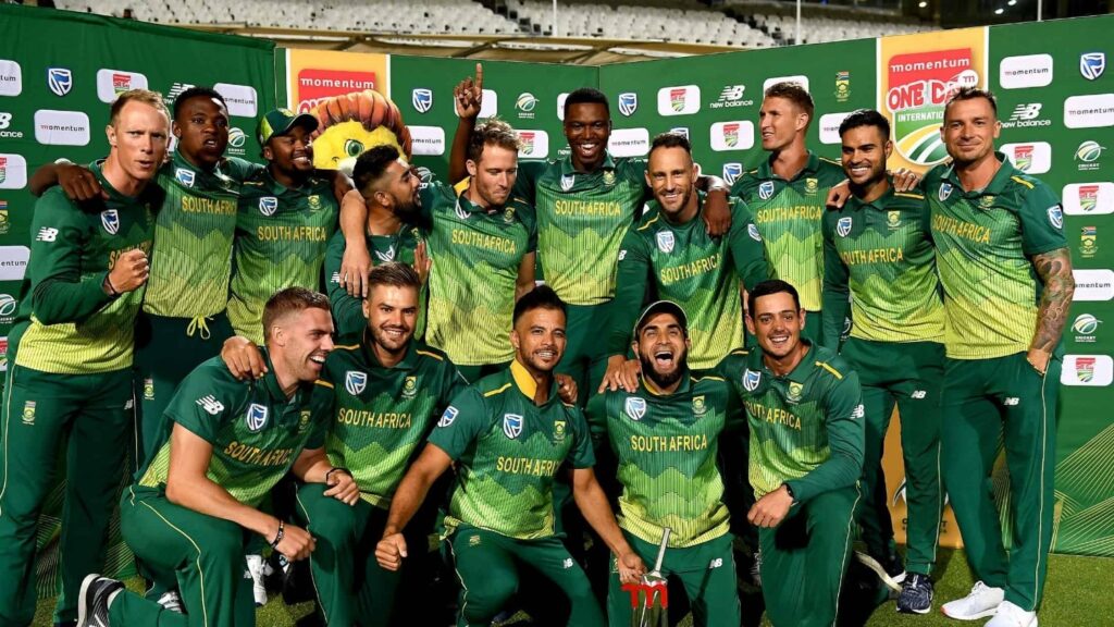 South African cricket team celebrates Momentum One Day International series victory holding trophy on the field
