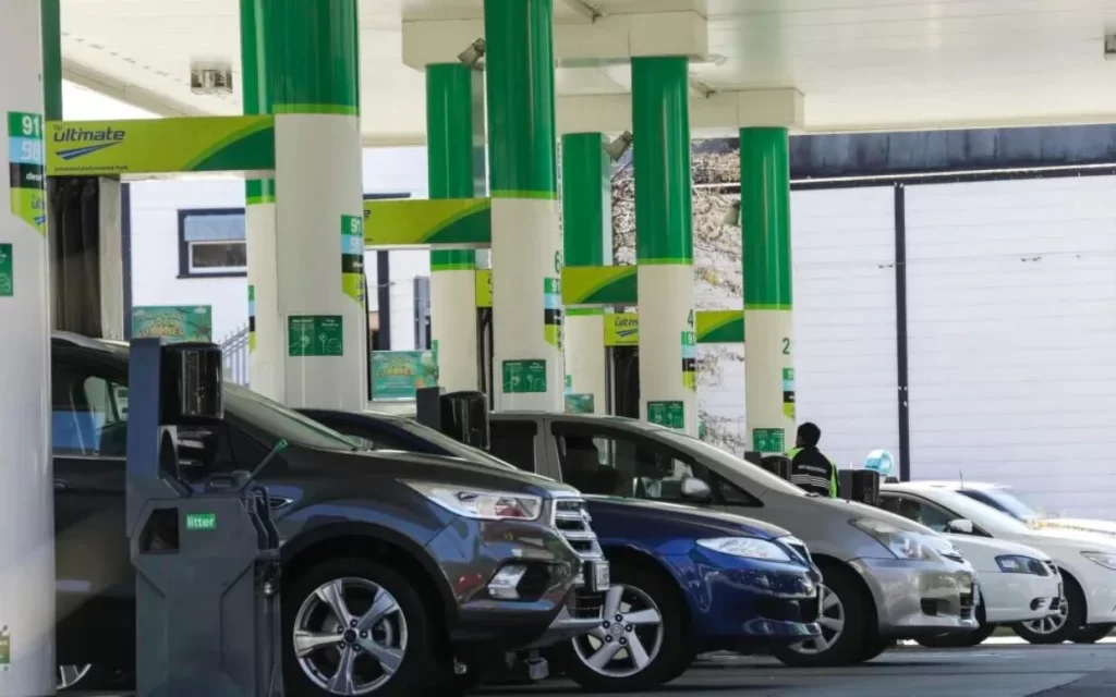 South African motorists refueling at a petrol station ahead of September 2026 fuel price hike